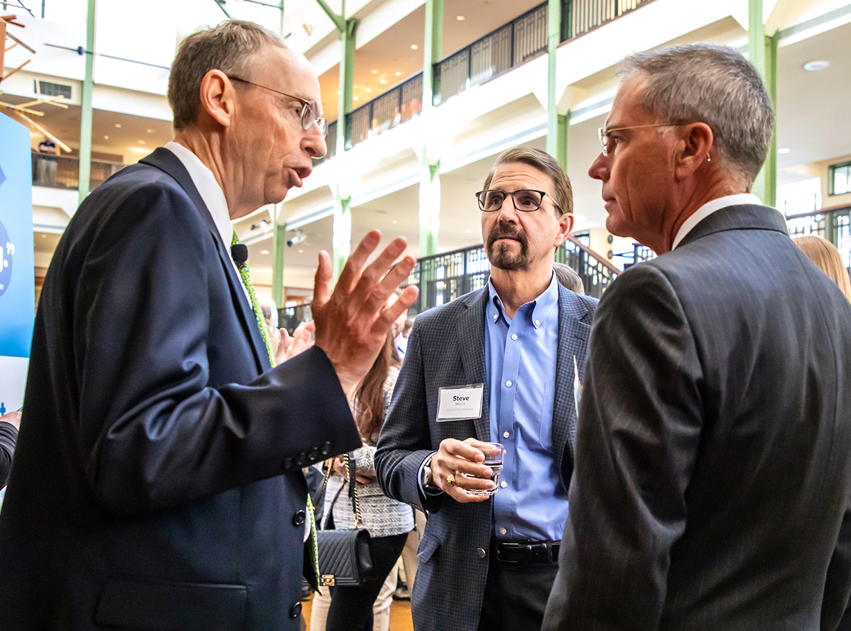 Steve Fleming, Steve Mills of DCA Capital Partners, and Lon Burford of Genovese Burford & Brothers at the Business Outlook Event