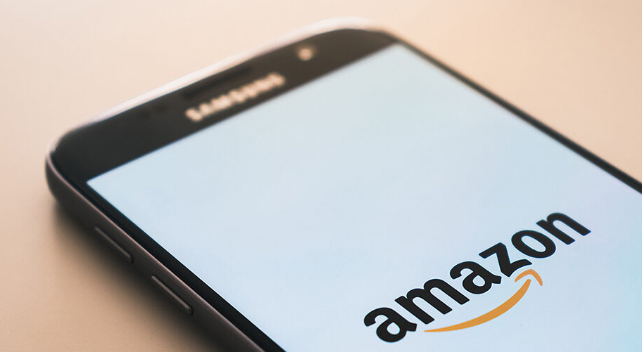 Mobile phone with Amazon logo on the screen