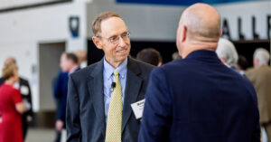 River City Bank's Steve Fleming chatting with a businessman